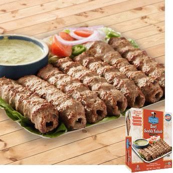 Beef seekh kabab resting on a bed of lettuce, it is garnished with onions and tomatoes, beside them is a blue bowl with a light green sauce. In the bottom right is an image of the product package