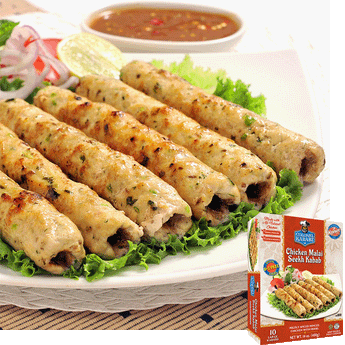 Malai kababs resting on a bed of lettuce on a white plate. In the background is garnishing and a brown sauce. In the bottom right is an image of the product package