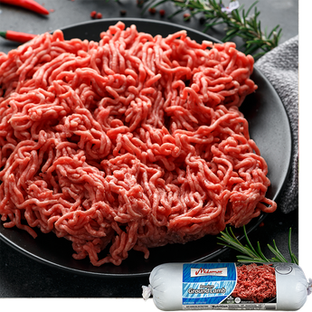 Ground lamb on a plate with a package of ground lamb in the foreground, featuring the brand Midamar