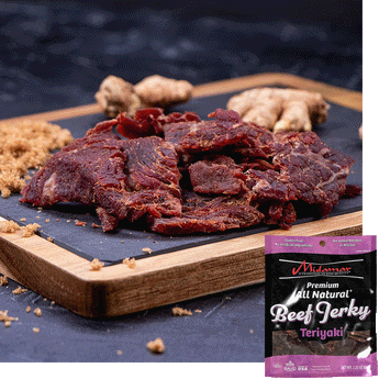 Midamar Halal Beef jerky Teriyaki pieces sit in a pile on a cutting board, brown sugar is sprinkled around and ginger is visible in the background. Overlaid is a picture of the bag.