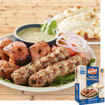 Tandoori Grill Platter with Chicken kababs, chicken tikka, chutney and naan. The product box is in the bottom right hand corner