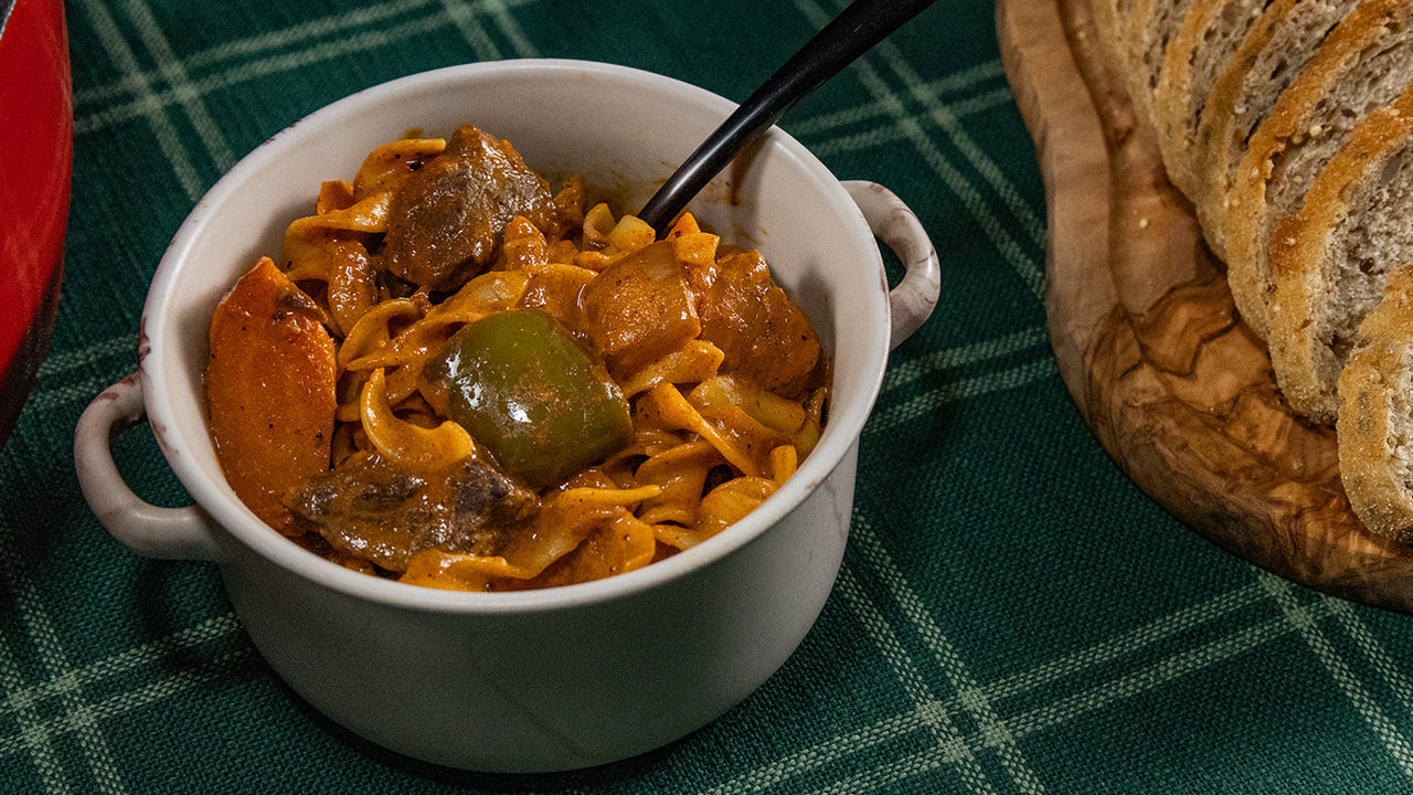 One-pot halal ground beef goulash Hungarian-style with paprika egg noodles for comfort dinner