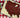 Top down image of a tender Halal meatloaf shaped like the United States, coated in a sweet and savory glaze, served with a bowl of convenient mixed vegetables.