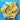 Chicken samosas layered on a white plate in a star pattern. In the center of the samosas is a green sauce with a single dark green leaf in the middle. The plate is resting on a blue background