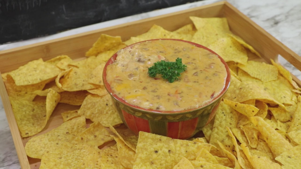 a video showing how to make chili con queso for labor day using midamar products