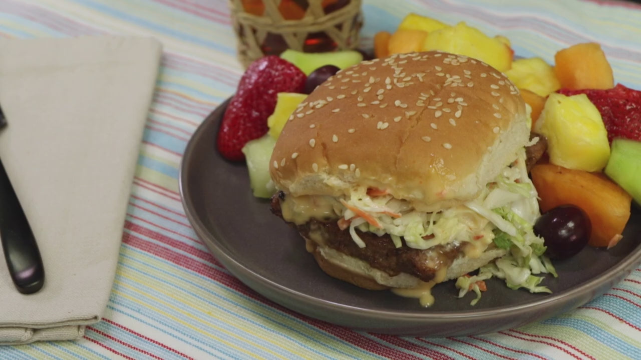 a video showing how to use midamar's seasoned beef patties to make an asian inspired burger called a bang bang burger